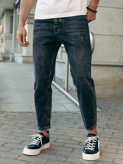 Серые джинсы с потертостями